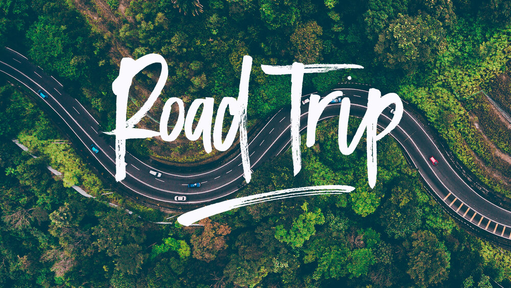 road trip written over a picture of a highway
